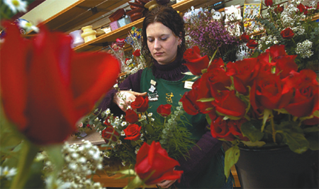 girl cutting flowers