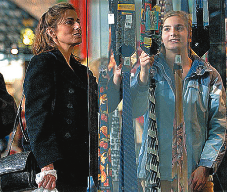 two women looking at clothes